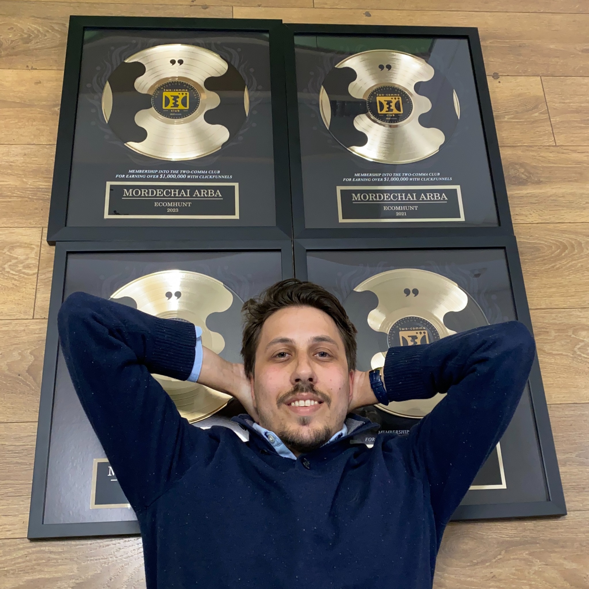 Mordechai Arba with his ClickFunnels Two Comma Club awards