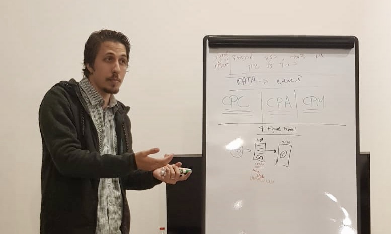Mordechai Arba leading a marketing workshop